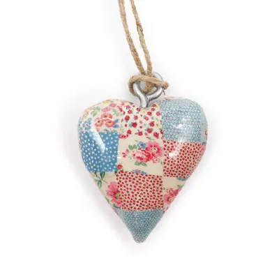 Image de Petit cœur en bois, décoratif - motifs bleus et rouges