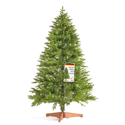 A green artificial Christmas tree on a white background.