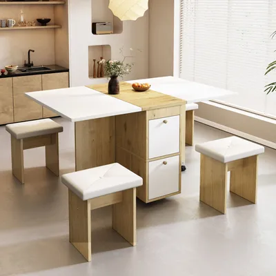 A compact dining set with a foldable table and four stools in a modern kitchen setting.