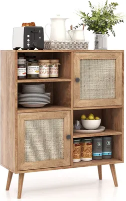 A wooden sideboard with rattan doors, filled with kitchen items like jars, plates, and a toaster.