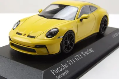 Produktbild von Minichamps 410069601 Porsche 911 (992) GT3 Touring 2021 gelb mit schwarzen Felgen 1:43