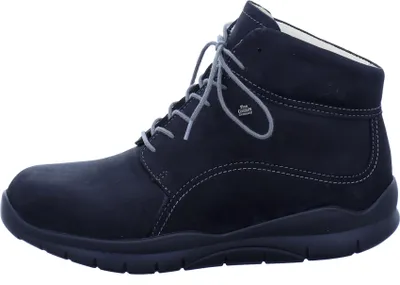 A side view of a black boot against a white background.
