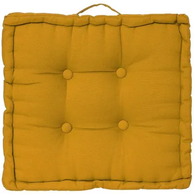 A square floor cushion with tufting and a handle on top.