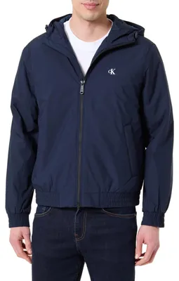 Image de Veste coupe-vent pour homme Calvin Klein, modèle Harrington à capuche, en tissu ripstop, couleur bleu