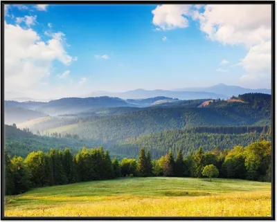 Produktbild von Wallario Wandbild Berglandschaft im Gebirge unter blauem Himmel, Größe: 40,30 x 50,30 cm, Poster mit schwarzem Aluminiumrahmen