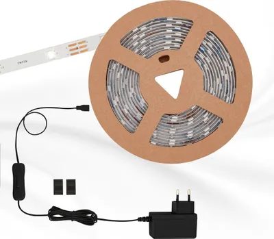 A roll of LED strip lights with its power adapter and switch.