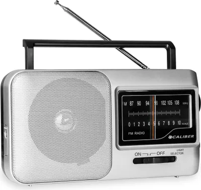 A silver and black portable radio with an antenna extended, shown against a white background.