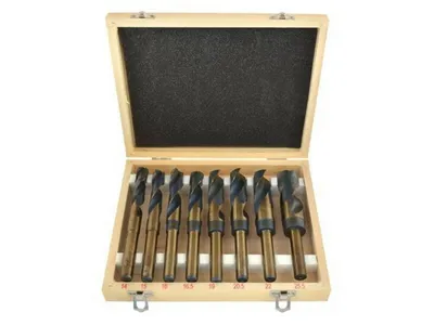 A set of drill bits in a wooden case.