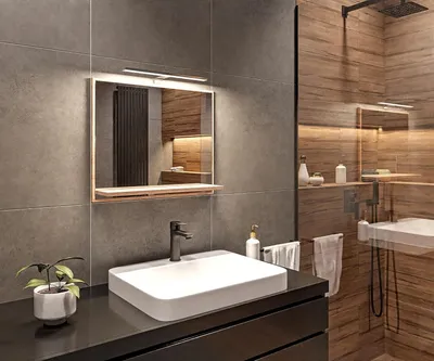 A modern bathroom with a sink, mirror, and shower.
