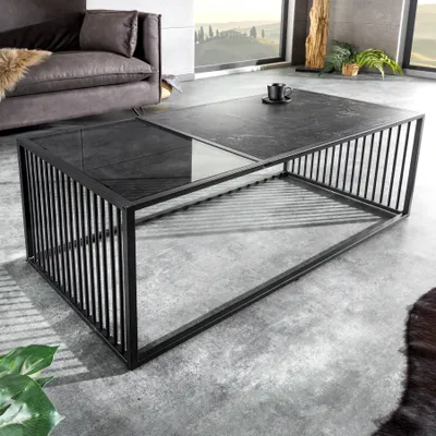 A modern living room setting with a couch and a coffee table.