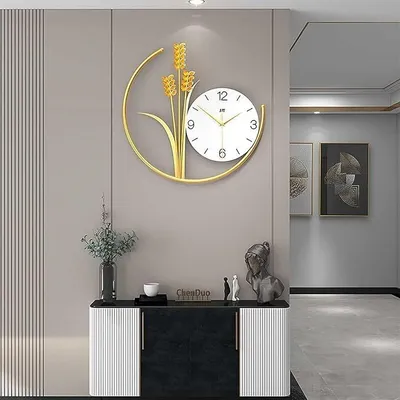 A modern hallway with a decorative clock and console table.