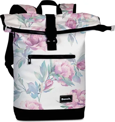 A roll-top backpack with a floral pattern.