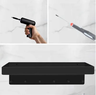Produktbild von Unyqoos Schlüsselrack aus robustem schwarzem Metall mit Ablagefläche für vielseitige Nutzung