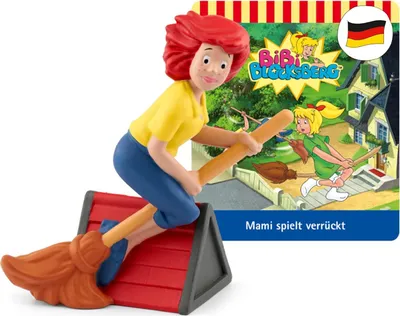 A toy figure of Bibi Blocksberg riding a broomstick, with a backdrop showing a scene from the show and the German flag.