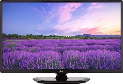 A flat-screen television displaying a scenic image of a lavender field under a colorful sky.