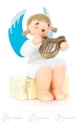 Produktbild von Engel mit Lyra auf Geschenkpaket sitzend  Höhe ca 5,5 cm NEU