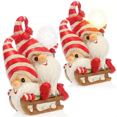 Produktbild von com-four® LED Wichtelfigur auf Schlitten - süße Weihnachtsdekoration mit Licht - weihnachtliche Wichtel-Deko zum Hinstellen - Weihnachtsdeko