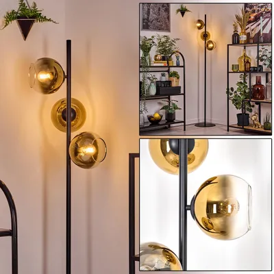 Produktbild von Cesaro Stehlampe aus Metall/Glas in Schwarz/Goldfarben/Klar