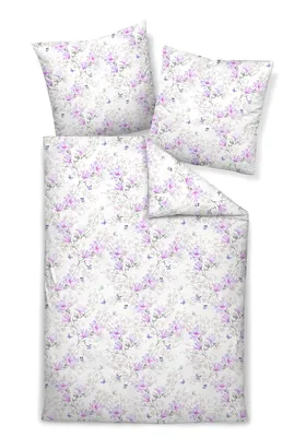 A bedding set with a floral pattern, including a duvet cover and two pillowcases, laid out flat on a white background.