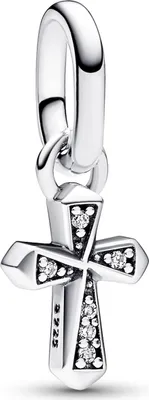 A silver cross charm with clear stones.