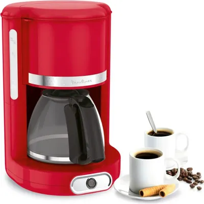 A red filter coffee machine with a glass carafe is shown next to two cups of coffee, coffee beans, and two wafer cookies.