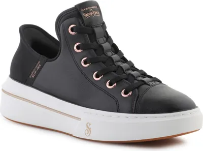 A studio shot of a single black Skechers sneaker.