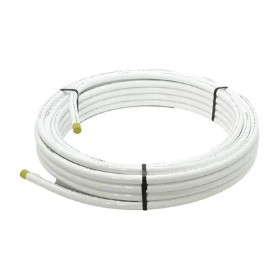 A coiled white pipe with yellow caps on the ends, secured by black ties.