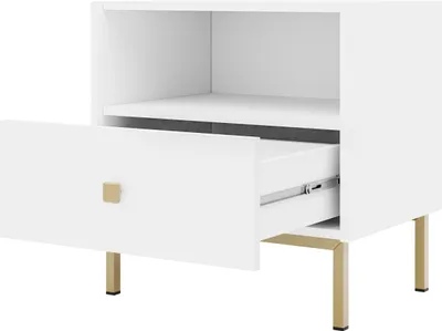 A close-up view of a white nightstand with one drawer partially open, revealing its interior and drawer slides. The nightstand has gold-colored legs and a gold square handle on the drawer.