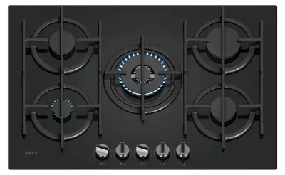 A top-down view of a black gas cooktop with five burners.