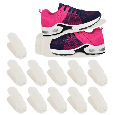 A set of shoe organizers and a pair of sneakers displayed on them.