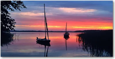 Produktbild von Tulup Glas-Bild -140x70- Wandkunst Dekorative Wand für Küche & Wohnzimmer - Landschaften - Segelboote - Orange