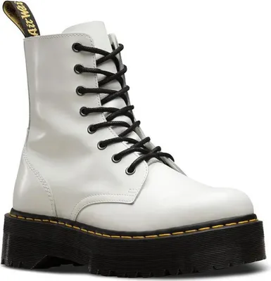 A studio shot of a white Dr. Martens platform boot.