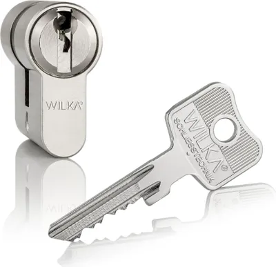 A silver lock cylinder and a silver key are displayed against a white background.