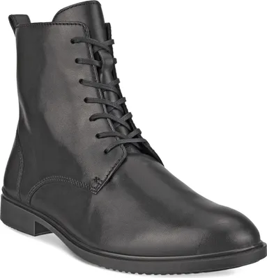 A black leather boot on a white background.