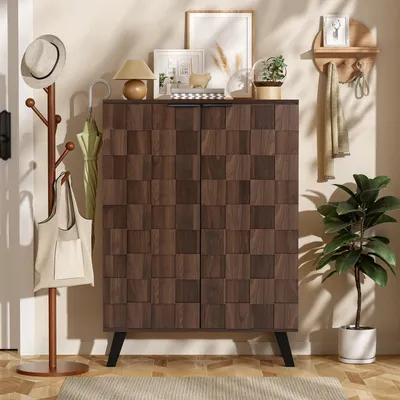 A hallway or entryway scene featuring a wooden cabinet, coat rack, and decorative items.