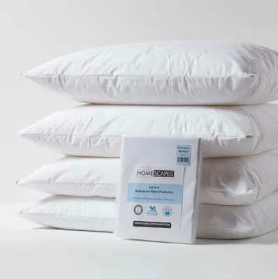 A stack of white pillows with a package of pillow protectors in front.