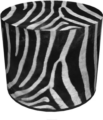 A cylindrical pouf with a zebra print pattern.