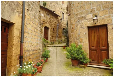 Produktbild von Wallario Premium Vliestapete Fototapete Weg durch die Altstadt - Toskana in Italien in der Größe 400 x 267 cm, extra dick, wird in 5 Teilen geliefert