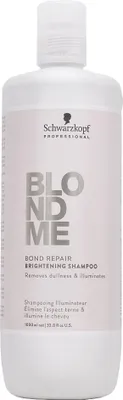 A white bottle of Schwarzkopf Professional BlondMe Bond Repair Brightening Shampoo.