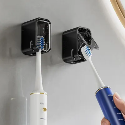Zdjęcie produktu dla Uchwyty na szczoteczki do zębów do montażu na ścianie, 2 sztuki, z pokrywką, samoprzylepne, wykonane z ABS, przezroczyste