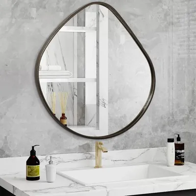 Image de Miroir mural en métal au design unique