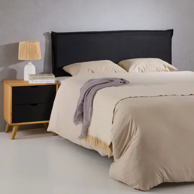 Produktbild von Kopfteil ISANDRE mit Holzbeinen 140 cm in schwarz - Gepolstertes Bettkopfteil für Doppelbetten, Headboard elegante Optik & hochwertiger Stoffbezug