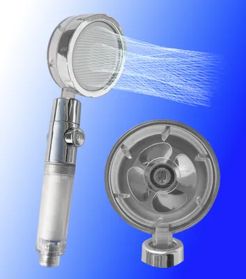 A shower head with water spraying from it, and a separate shower head base.