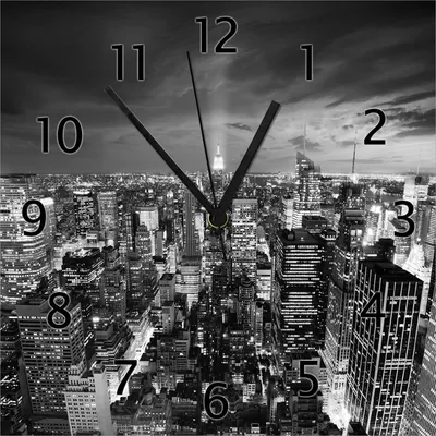 Produktbild von Wallario Design Wanduhr New York bei Nacht - Panoramablick über die Stadt - schwarzweiß aus Echtglas, Größe 30 x 30 cm
