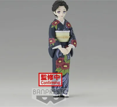 A figurine of a woman in a kimono against a plain background.
