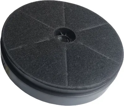 A black circular carbon filter for a range hood.