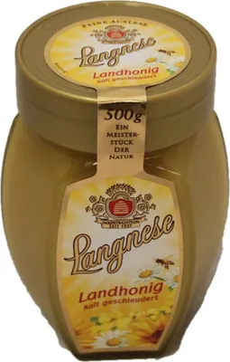 A jar of Langnese Landhonig honey.
