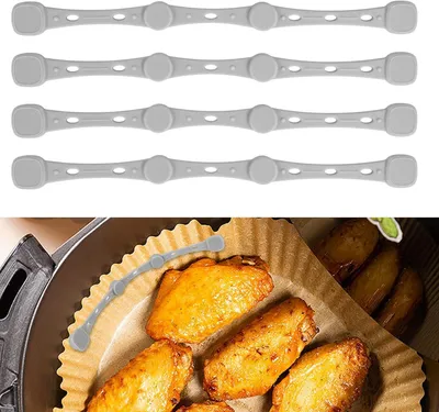 Produktbild von 4 Silikonmagnete für Backpapier in der Heißluftfritteuse (Grau)