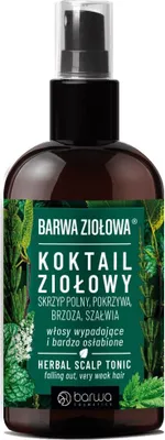 A bottle of herbal scalp tonic with green botanical illustrations on the label.
