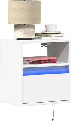 A white floating nightstand with a drawer and an open shelf illuminated by blue LED lights. A lamp and books are on top.
